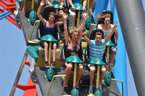 Kids having fun in <b>amusement</b> <b>park</b> roller coaster during COVID-19 pandemic Kids having fun in a small roller coaster in <b>amusement</b> <b>park</b>. . Girls flashing and amusement park photos